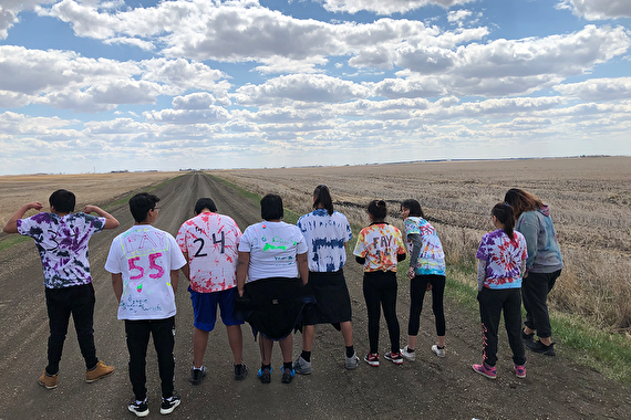 Group of youth outdoors in matching shirts