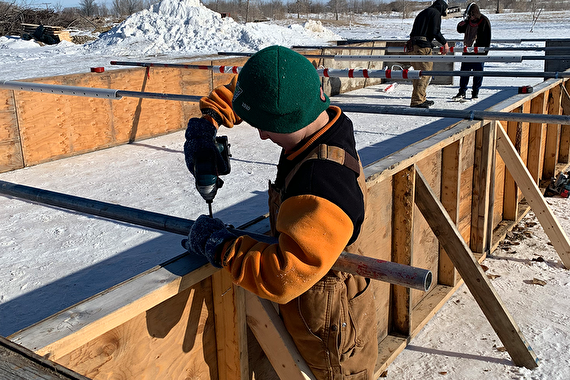 Youth using tools